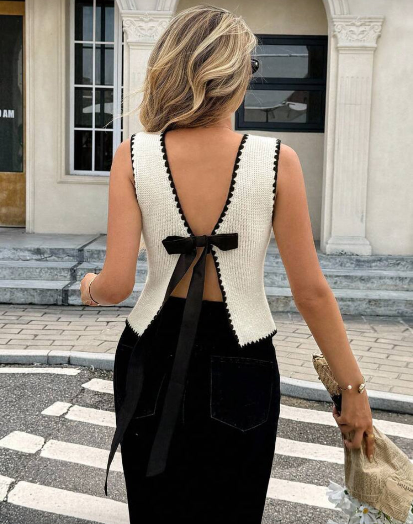 Blusa de punto con lazo E26XJ08