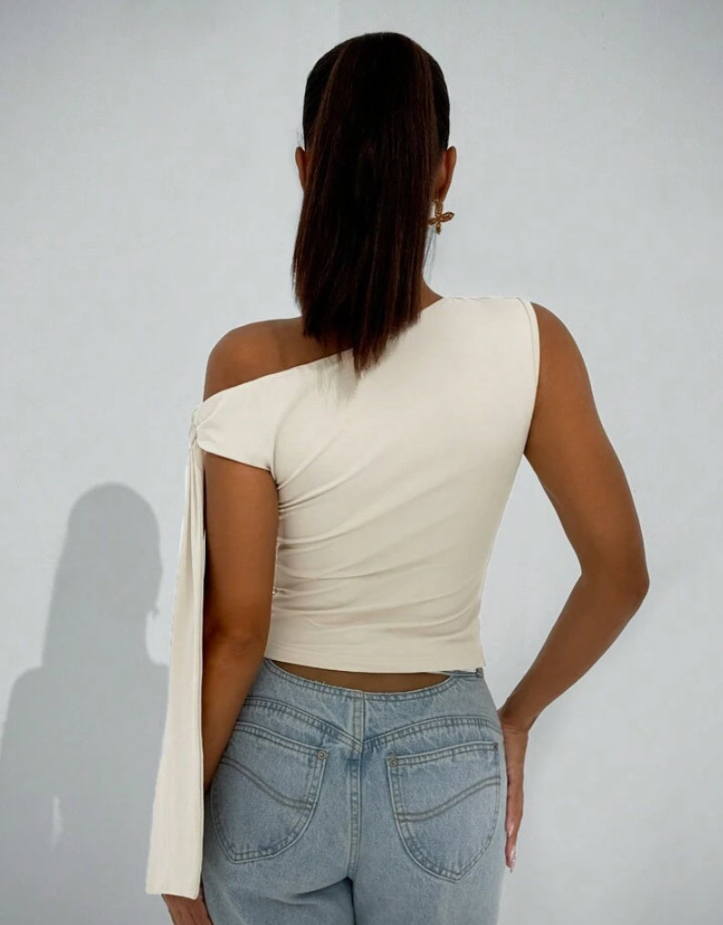 Blusa asimetrica con lazo en el hombro AG25TR04