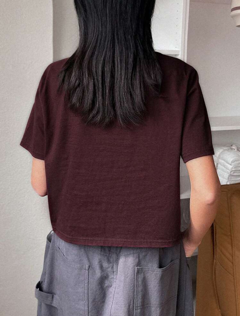 Camiseta corta con slogan A25IX09