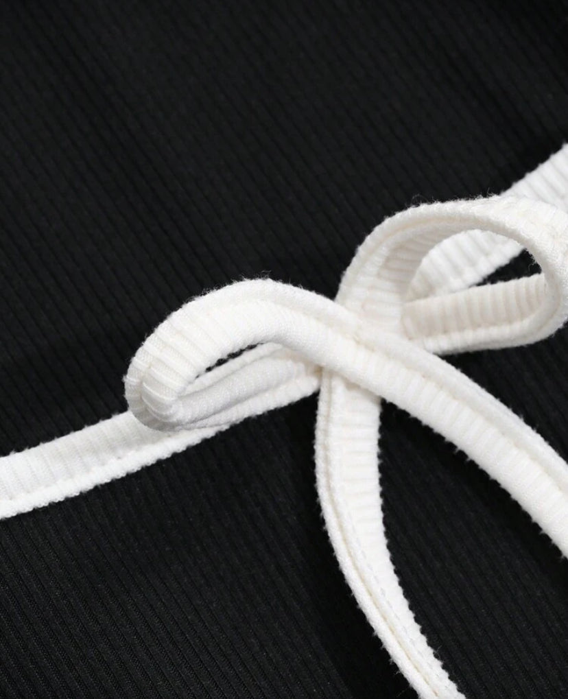 Blusa manga larga con lazo E26XT02