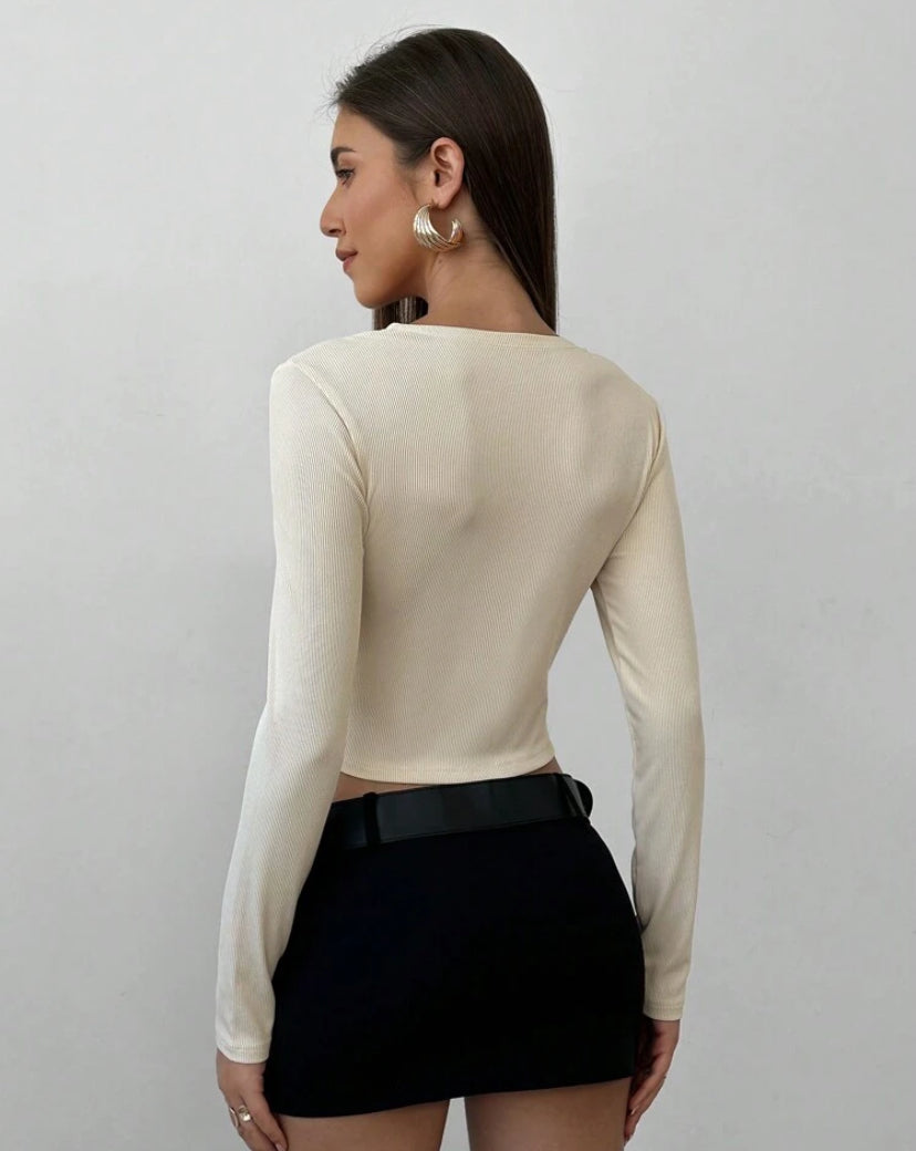 Top casual de manga larga con cuello en V A25PI03