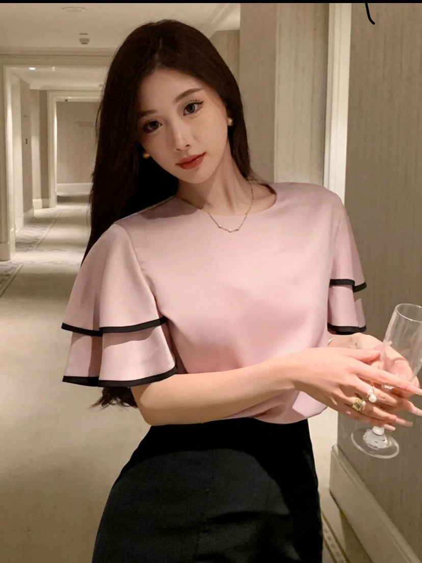 Blusa elegante para mujer con dobladillo A25PS010