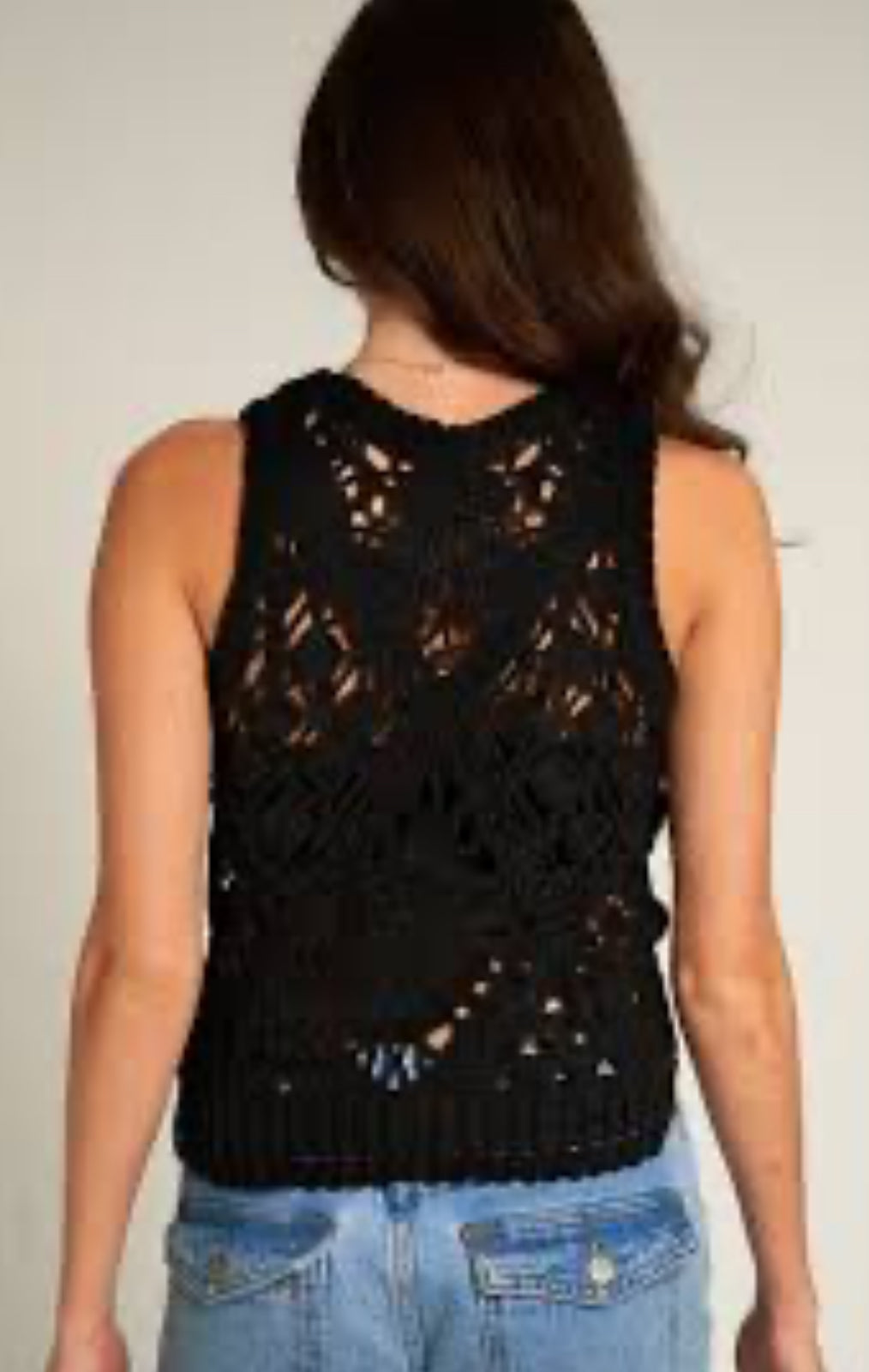 Trazacielos blusa de encaje sin mangas. J25RS02