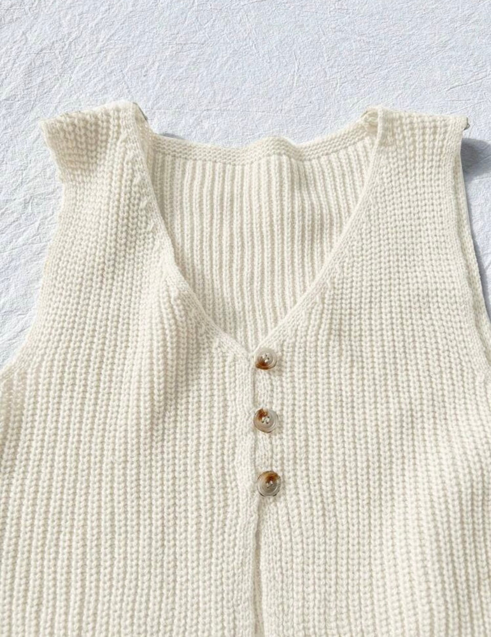 Blusa de Punto Acanalado con Botones. A25PB02