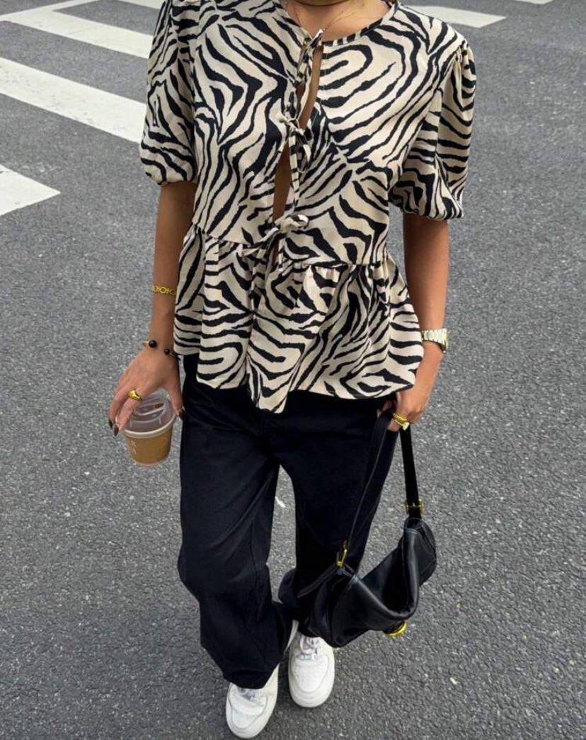 Blusa con estampado de cebra E26XL010