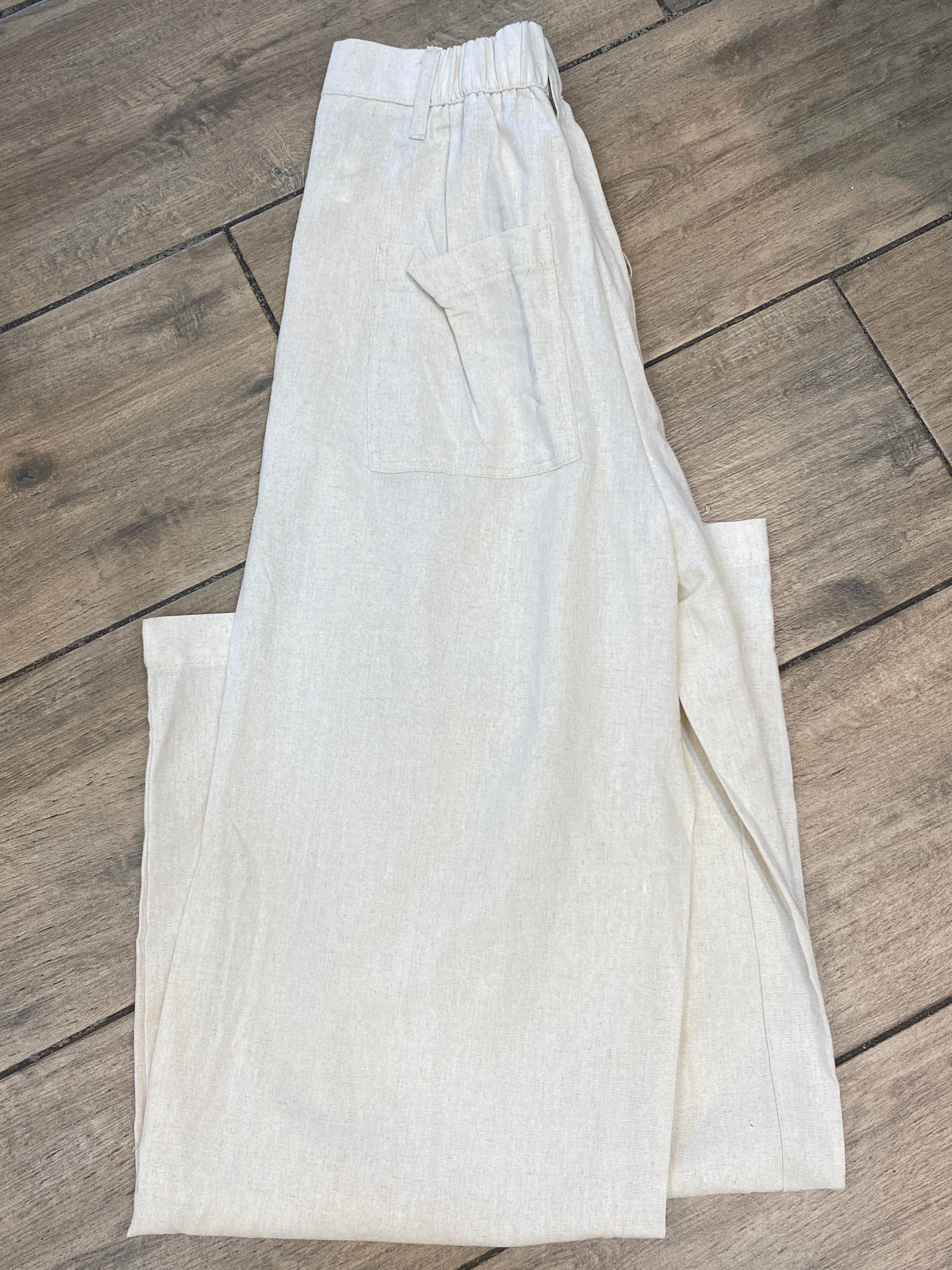 Pantalón acampanado de tela J25RF04