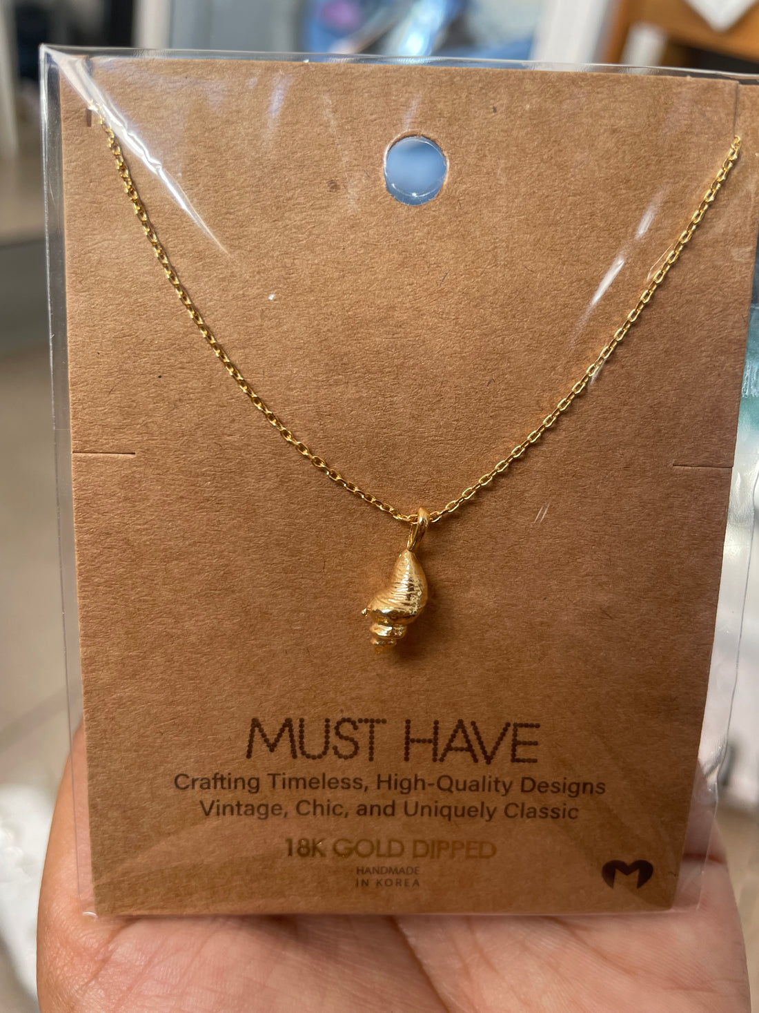 Collar caracola de mar O25WB09