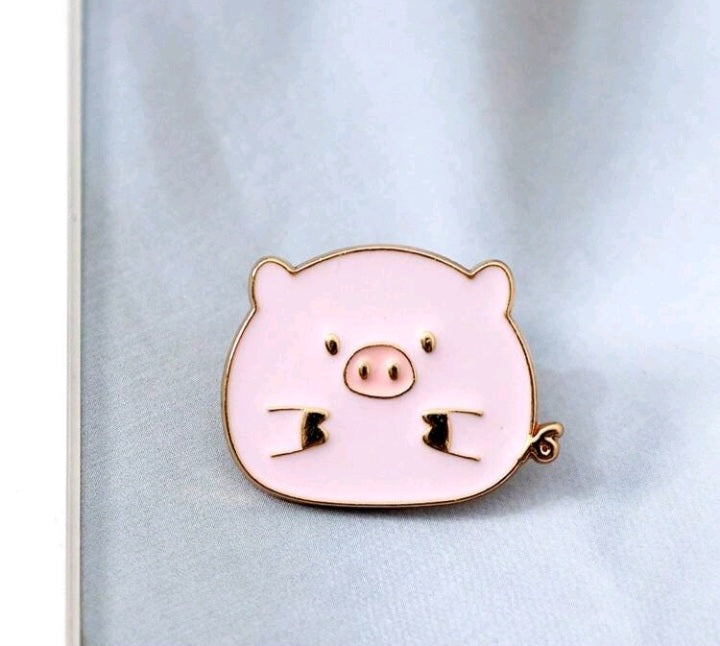 Broche Cerdito Encantado. S25VG04