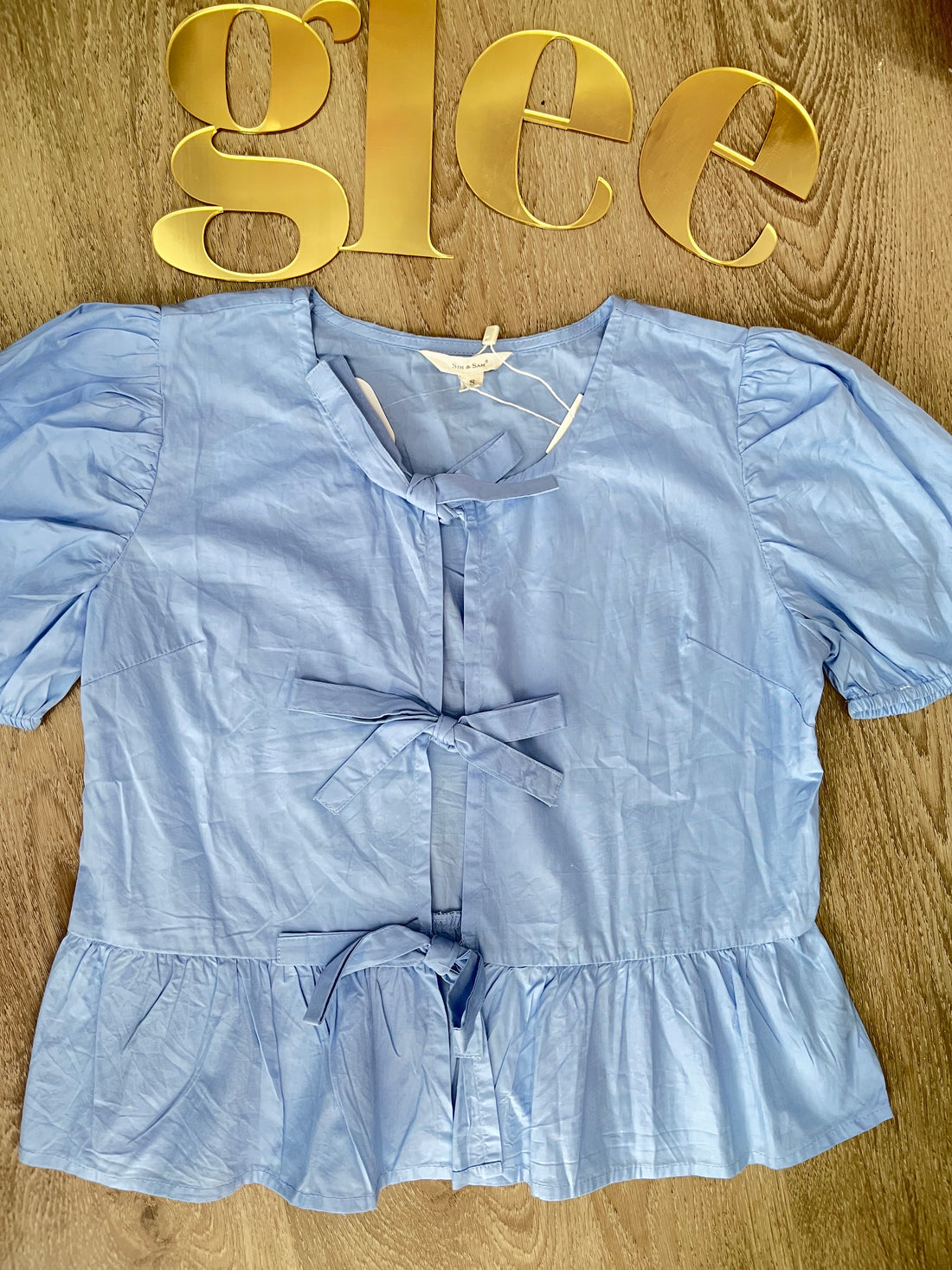 Blusa holgada de moñitos J25QZ08