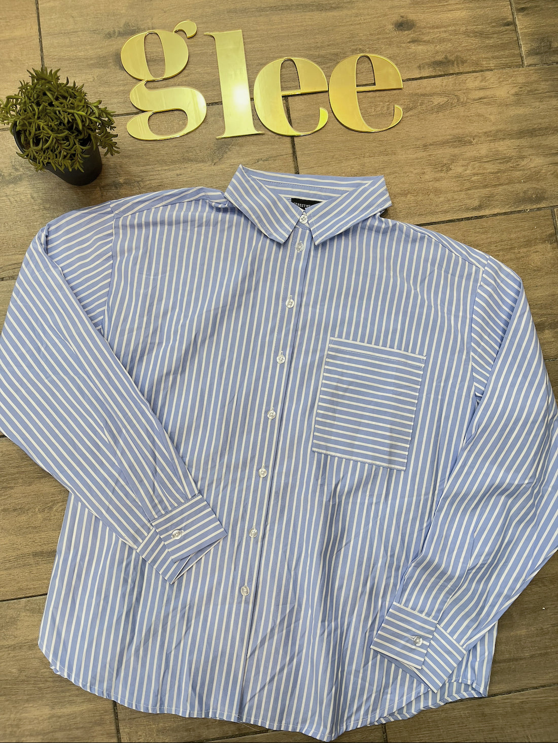 Blusa formal de rayas J25RA02