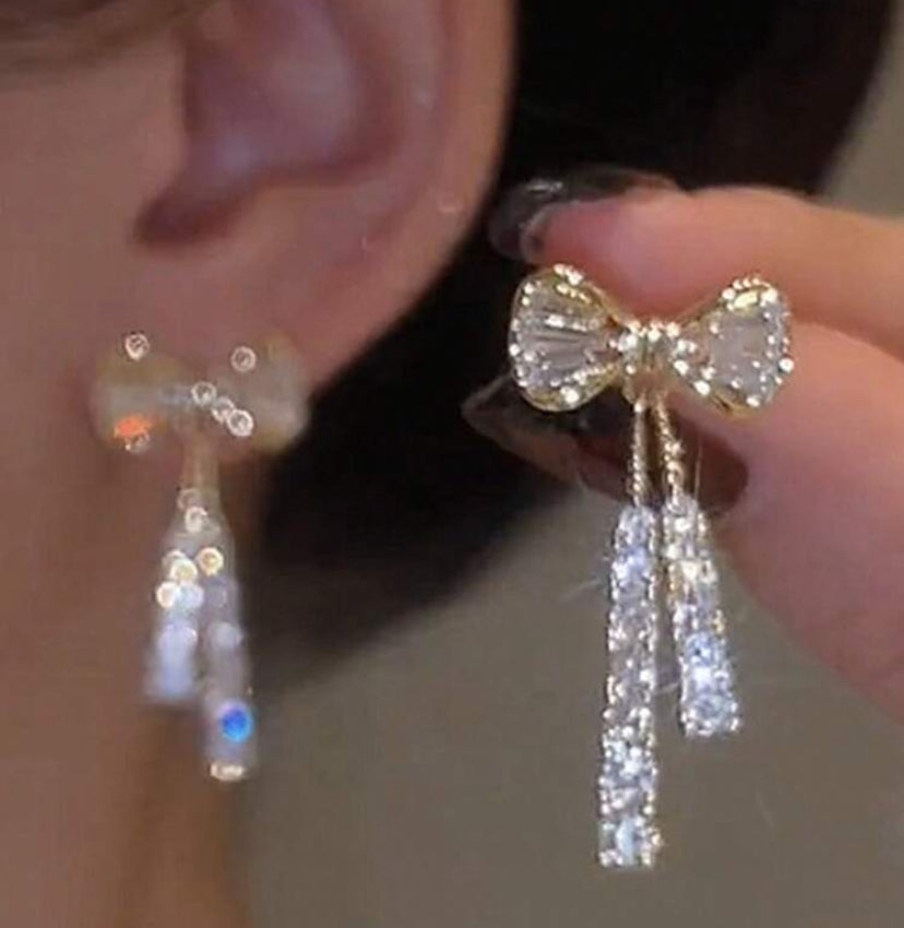 Brillo nocturno pendientes con diseño de lazo y cristal Z F25NG04