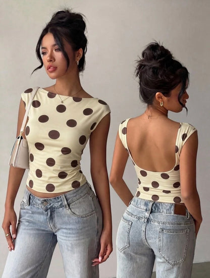 Blusa con escote y puntos