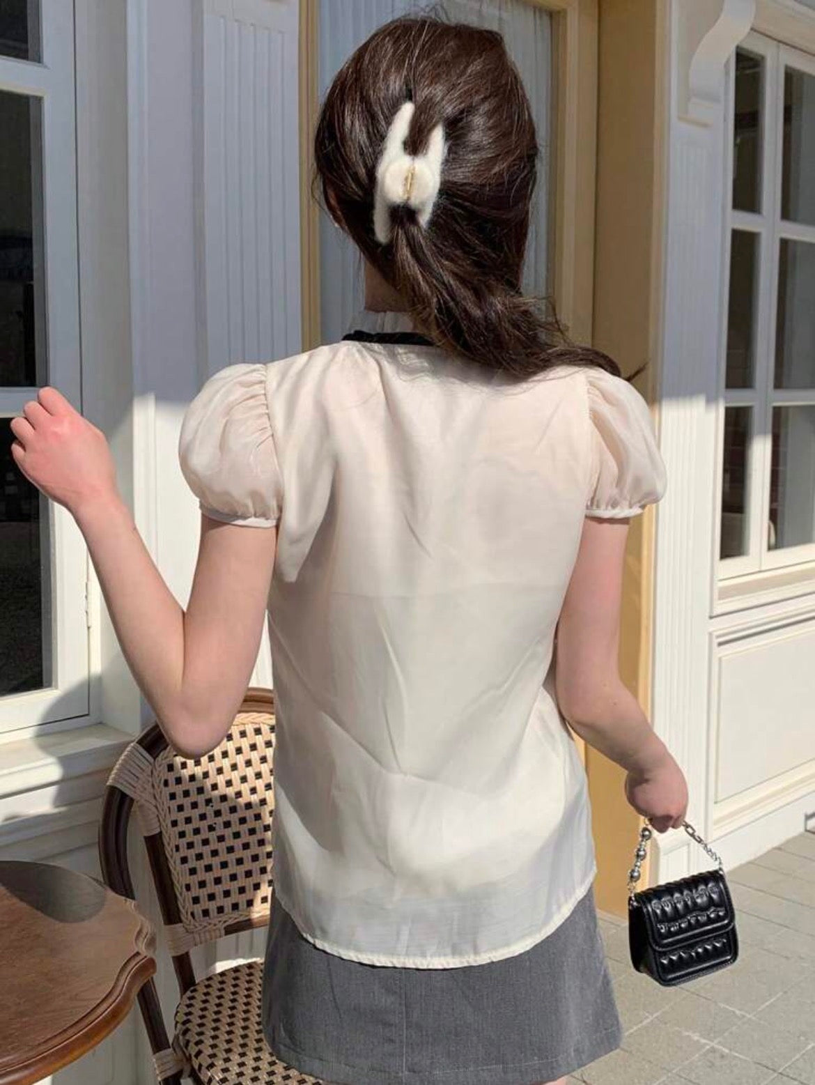 Blusa de mangas abullonadas