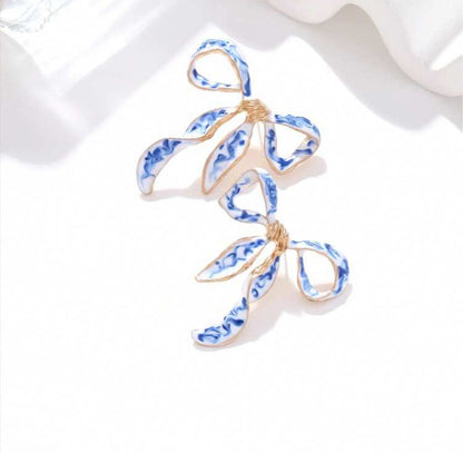 PENDIENTES DE LAZO DE PORCELANA