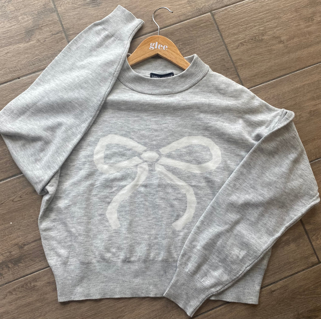 Cardigan con moño coquette J25RY04