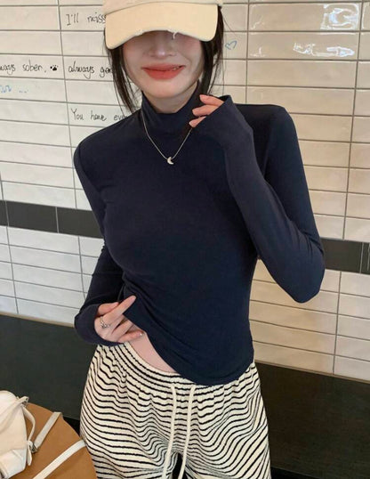 Blusa cuello alto azul profundo M25ÑK06