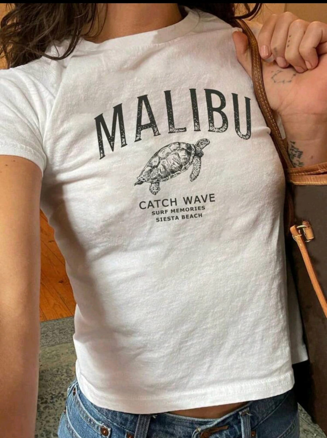 Camiseta de mujer tipo bebe con estampado A25PZ03