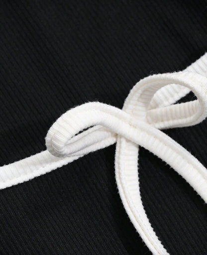 Blusa  manga larga con lazo E26XT02