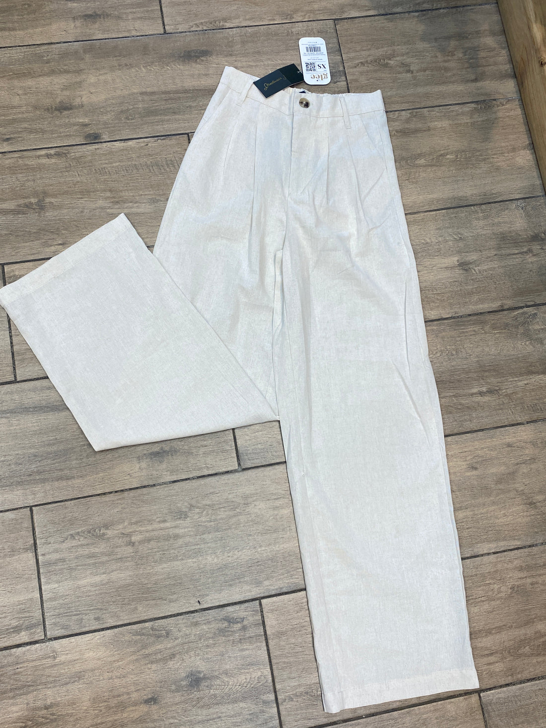 Pantalón acampanado de tela J25RF04