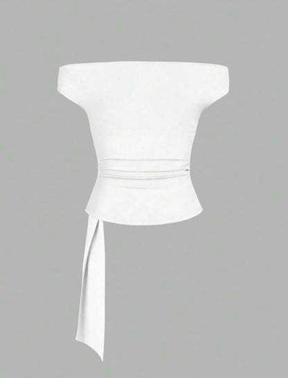 Blusa blanca con hebilla