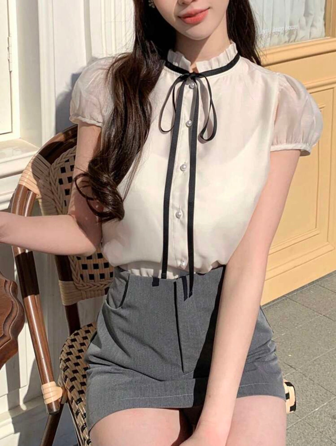 Blusa de mangas abullonadas