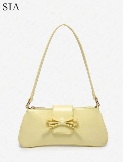 Bolso de mano amarillo
