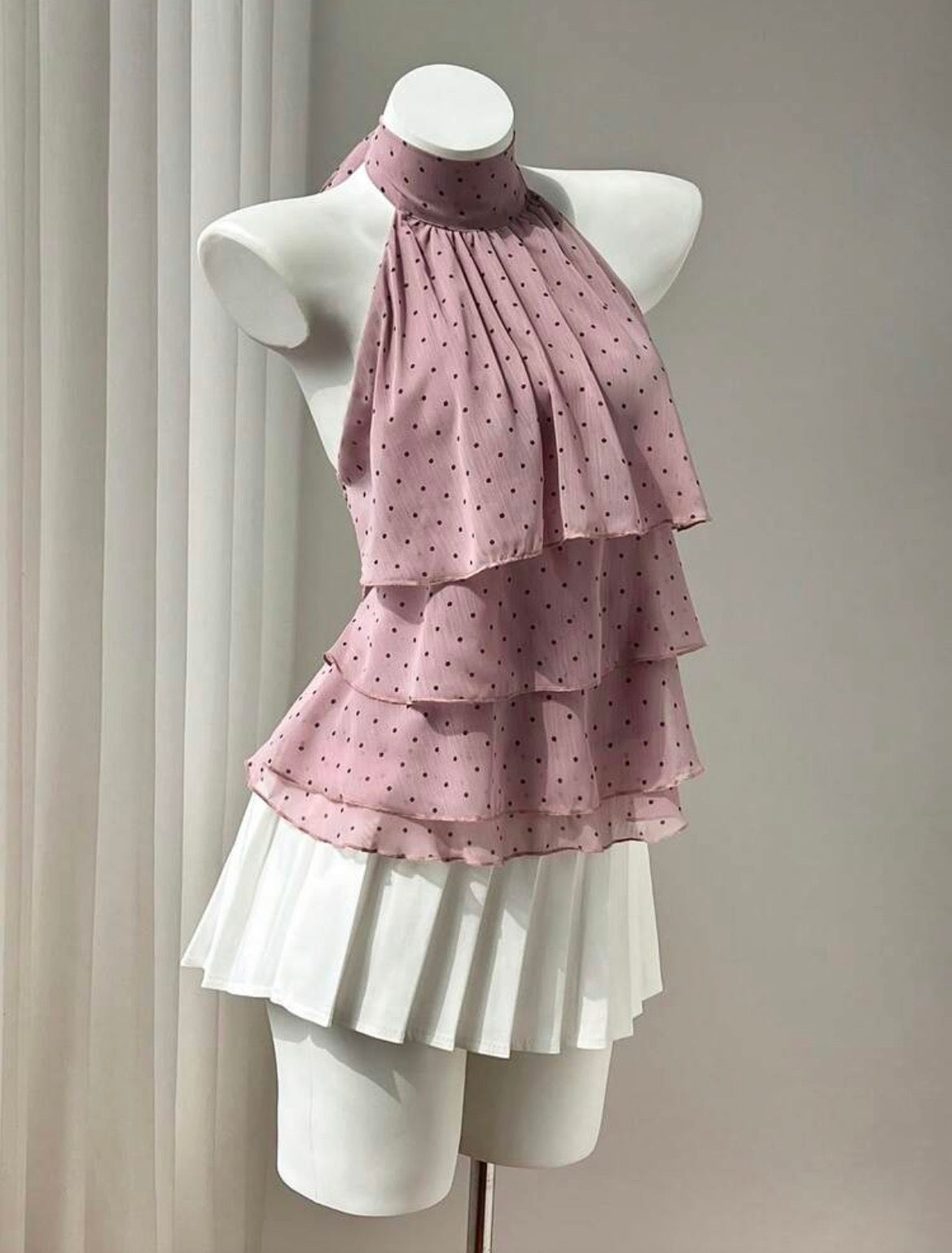 Blusa con revuelo