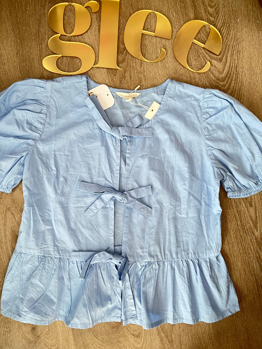 Blusa holgada de moñitos J25QZ08