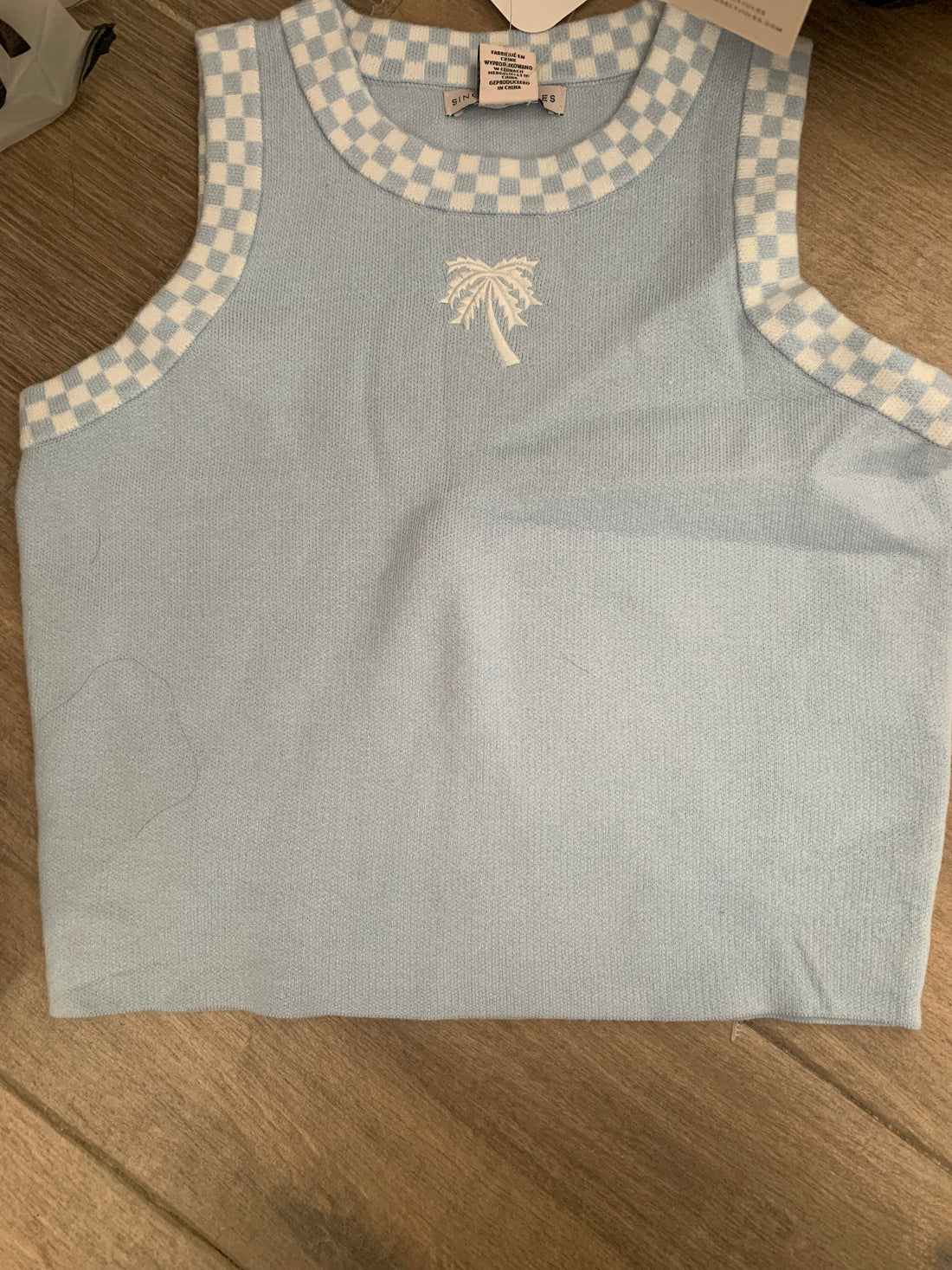 Camiseta con bordado de palmera J25RG01