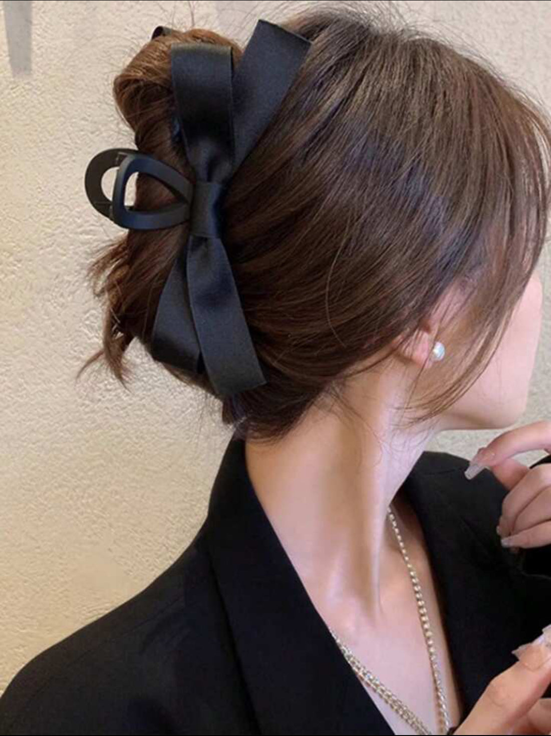 Pinza de pelo con lazo negro. A25ÑV07