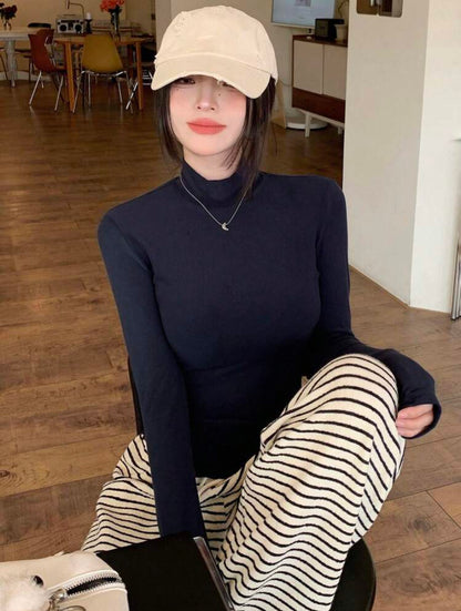 Blusa cuello alto azul profundo M25ÑK06