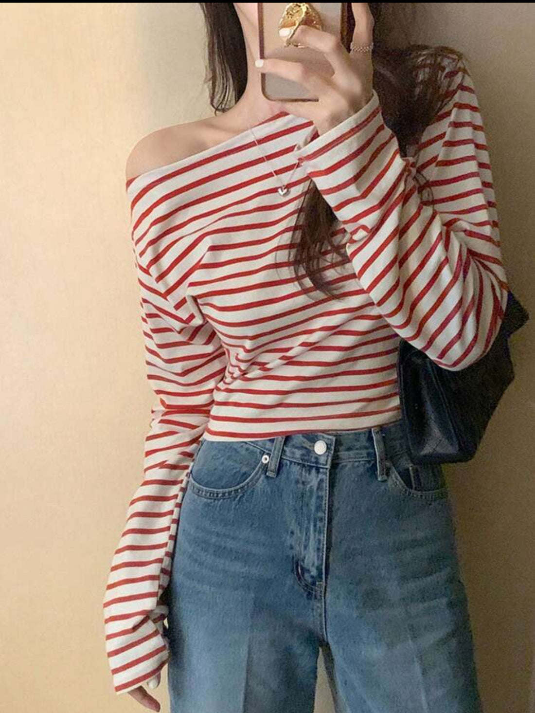 Blusa de hombros caídos y líneas J25SÑ05