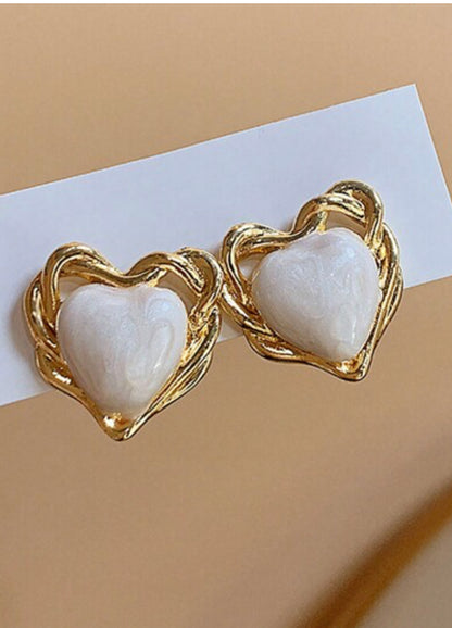 Amor a Primera Vista Pendientes de Botón CC. F25MY03