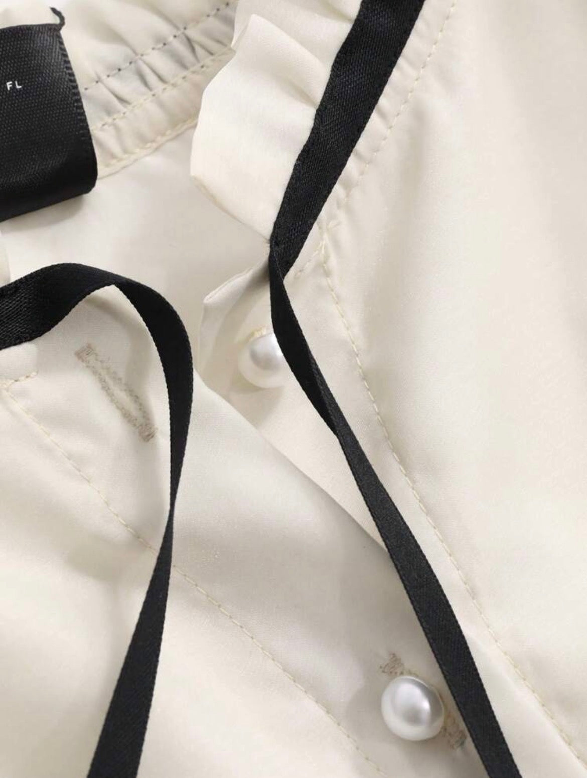 Blusa de mangas abullonadas