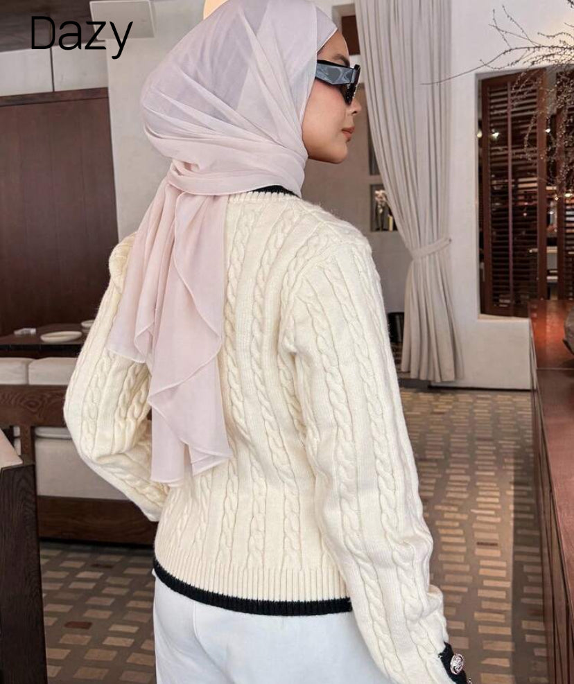 Suéter de punto con botones D25XA09